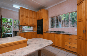 Outdated Long Island kitchen in need of a remodel — before e-design by Spaces by Candi