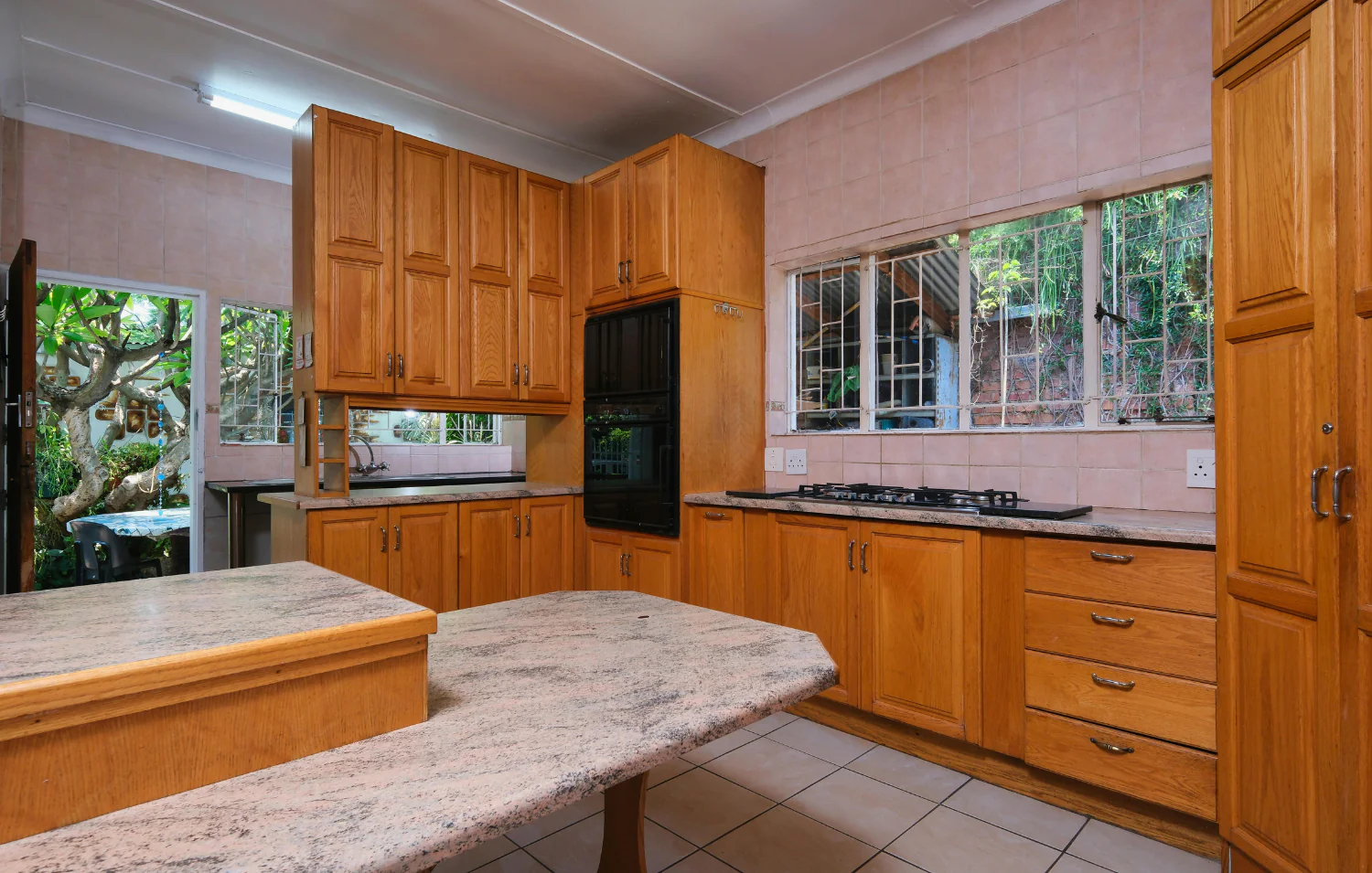 Outdated Long Island kitchen in need of a remodel — before e-design by Spaces by Candi